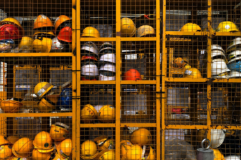 Hard hats in cages