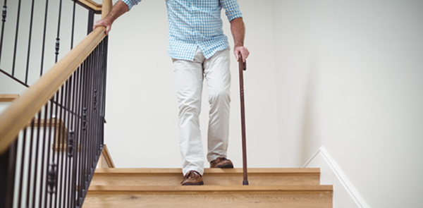 elderly person on stairs
