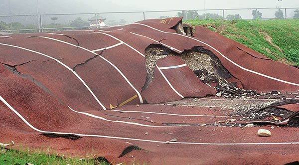 earthquake buckled running track