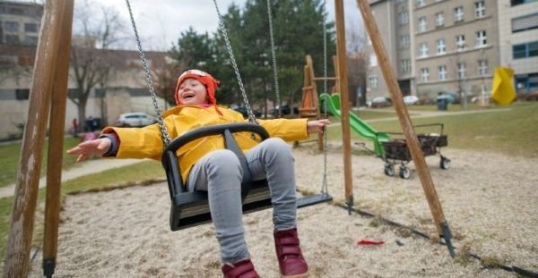 child on swing