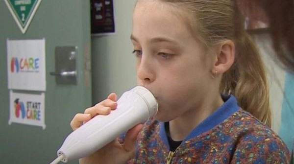 Child using inhaler
