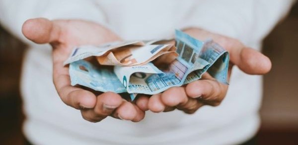 Person holding money