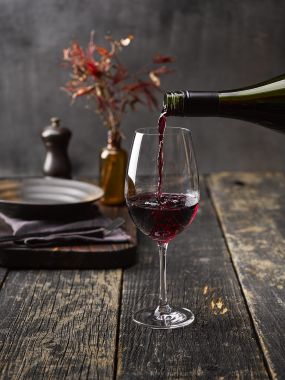 pouring pinot noir wine